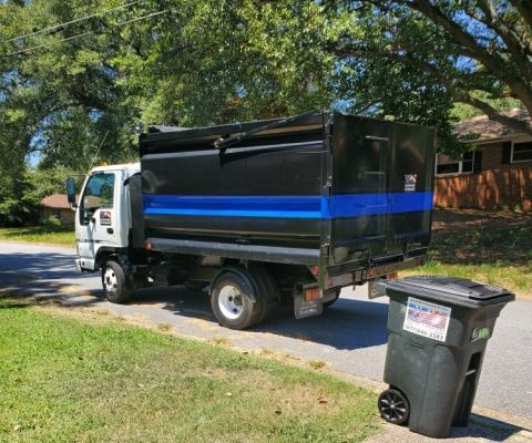 Junk Removal Service Truck - Blue Line Waste Services, LLC
